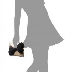Greta Satin Bow Clutch by Felix Rey on model