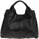 Kim Kardashian totes a brand new bag - the Givenchy Large Elschia Sac
