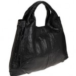 Kim Kardashian totes a brand new bag - the Givenchy Large Elschia Sac